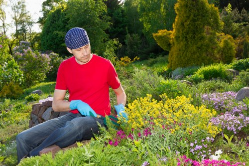 Team implementing public protection measures during garden work